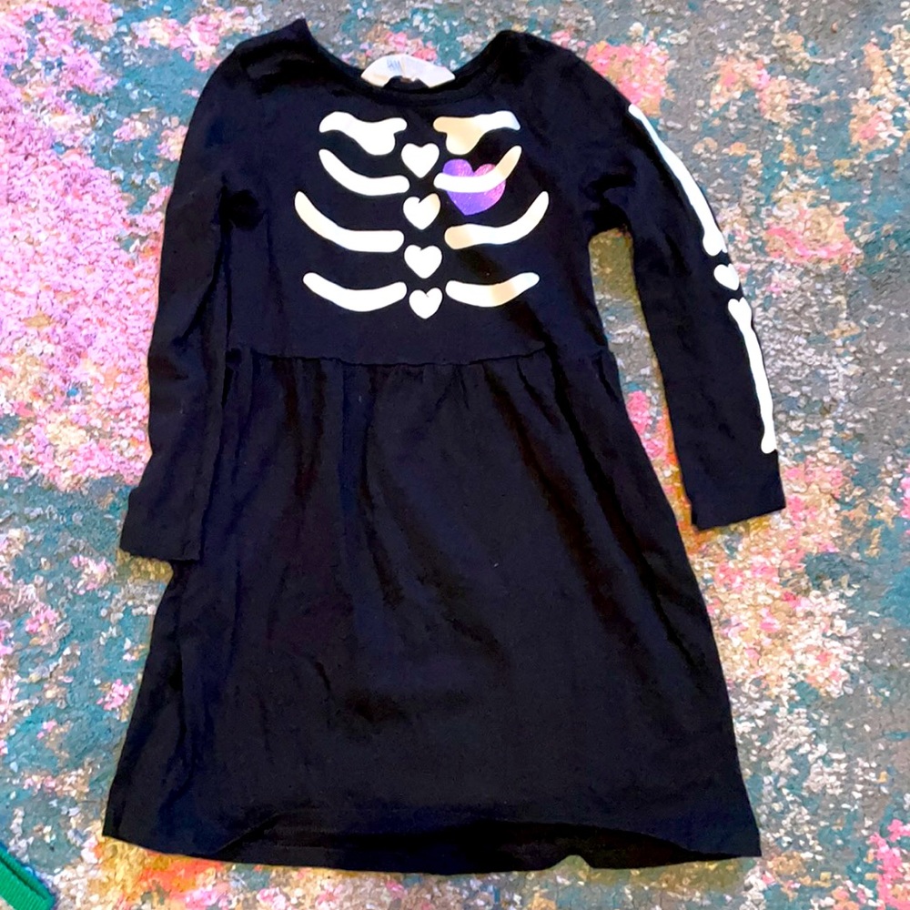 H&M dress with skeleton design, size 2-4